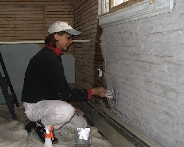 plastering the wall